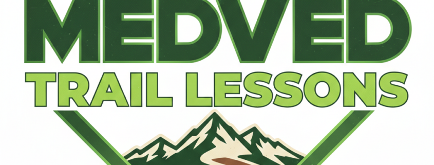Medved Trail Lessons logo featuring a mountain landscape and winding trail inside a green diamond frame.