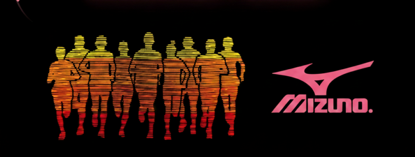 Promotional graphic for the "Sweetheart Endurance Project" featuring a Mizuno Demo Run. The image shows a silhouette of a group of runners in sunset colors against a black background with floating pink hearts. Text includes: Feb 14th @ 8 AM at Medved Running & Walking Outfitters.